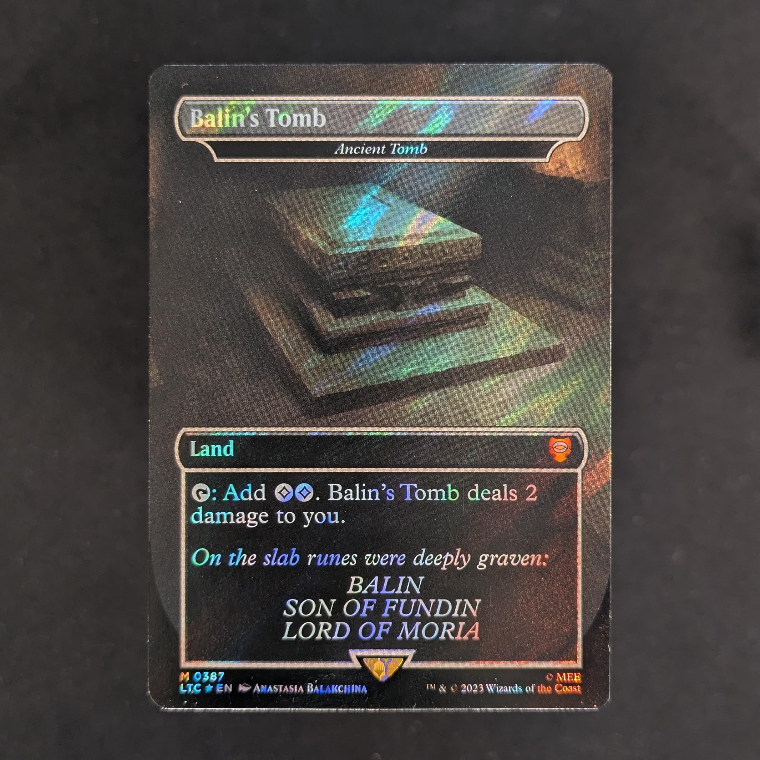 MTG Singles - [FOIL] Ancient Tomb (Surge Foil) - Commander: The Lord of the Rings: Tales of Middle-earth: Extras - NM - 