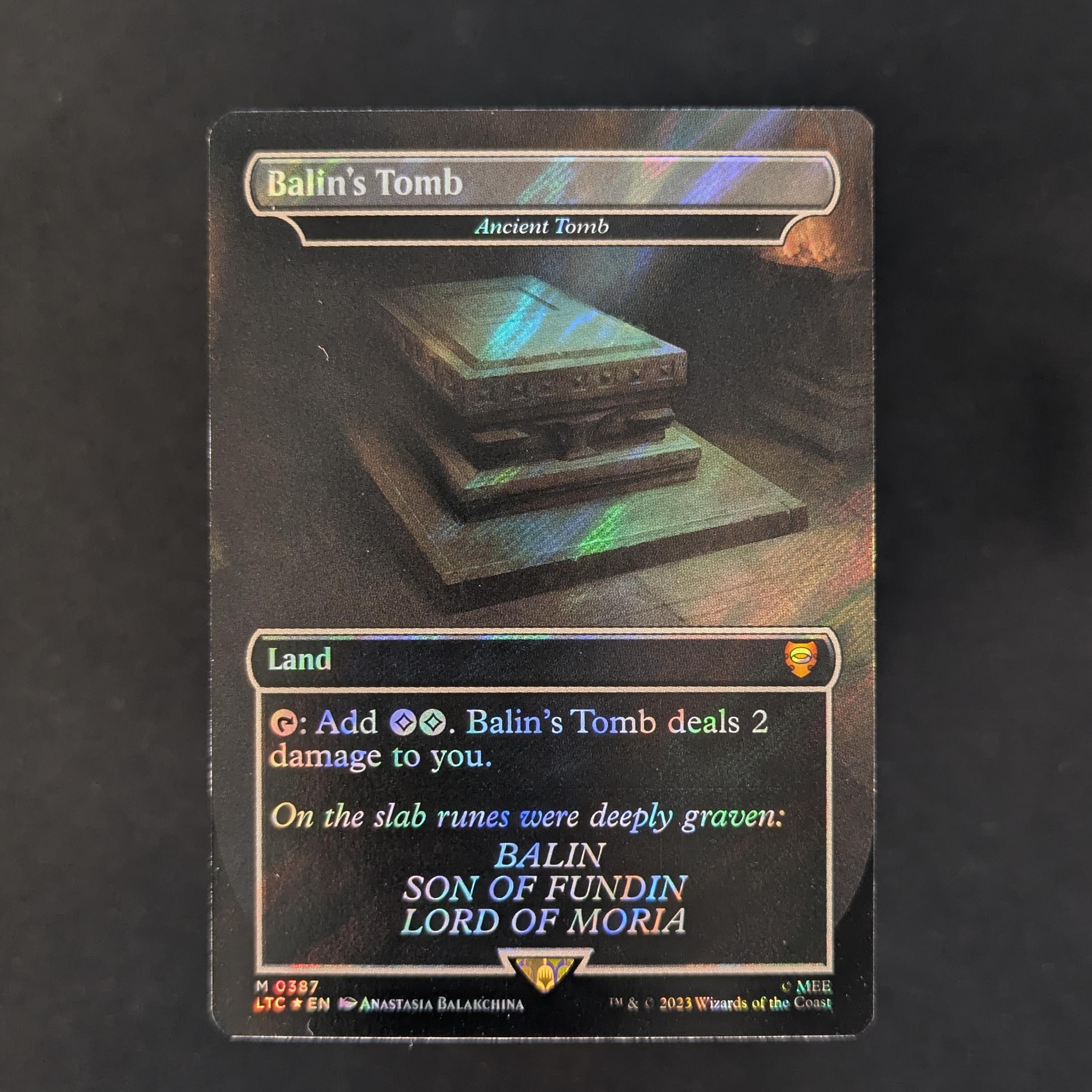 MTG Singles - [FOIL] Ancient Tomb (Surge Foil) - Commander: The Lord of the Rings: Tales of Middle-earth: Extras - NM - 