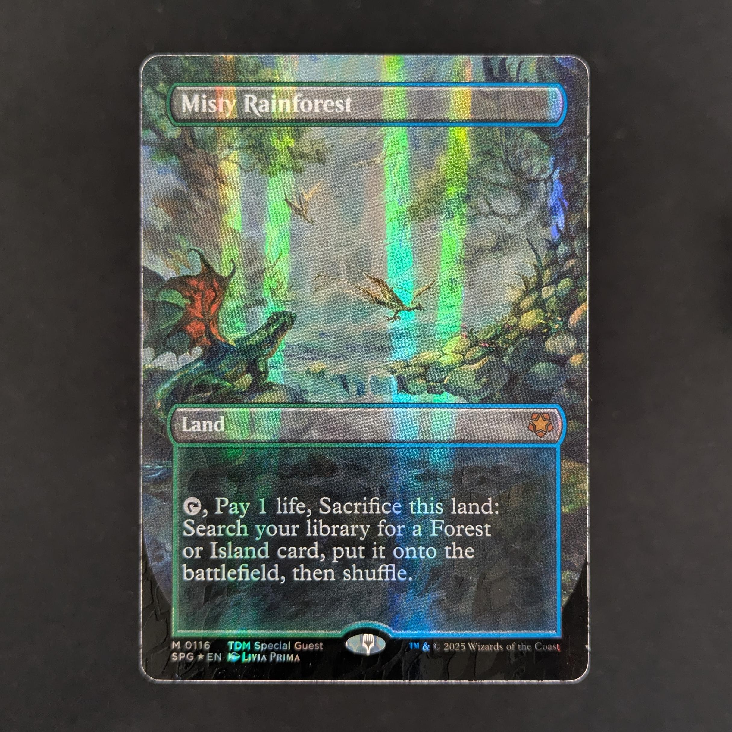 MTG Singles - [FOIL] Misty Rainforest (Dragonscale Foil) - Commander: The Lord of the Rings: Tales of Middle-earth: Extras - NM - 