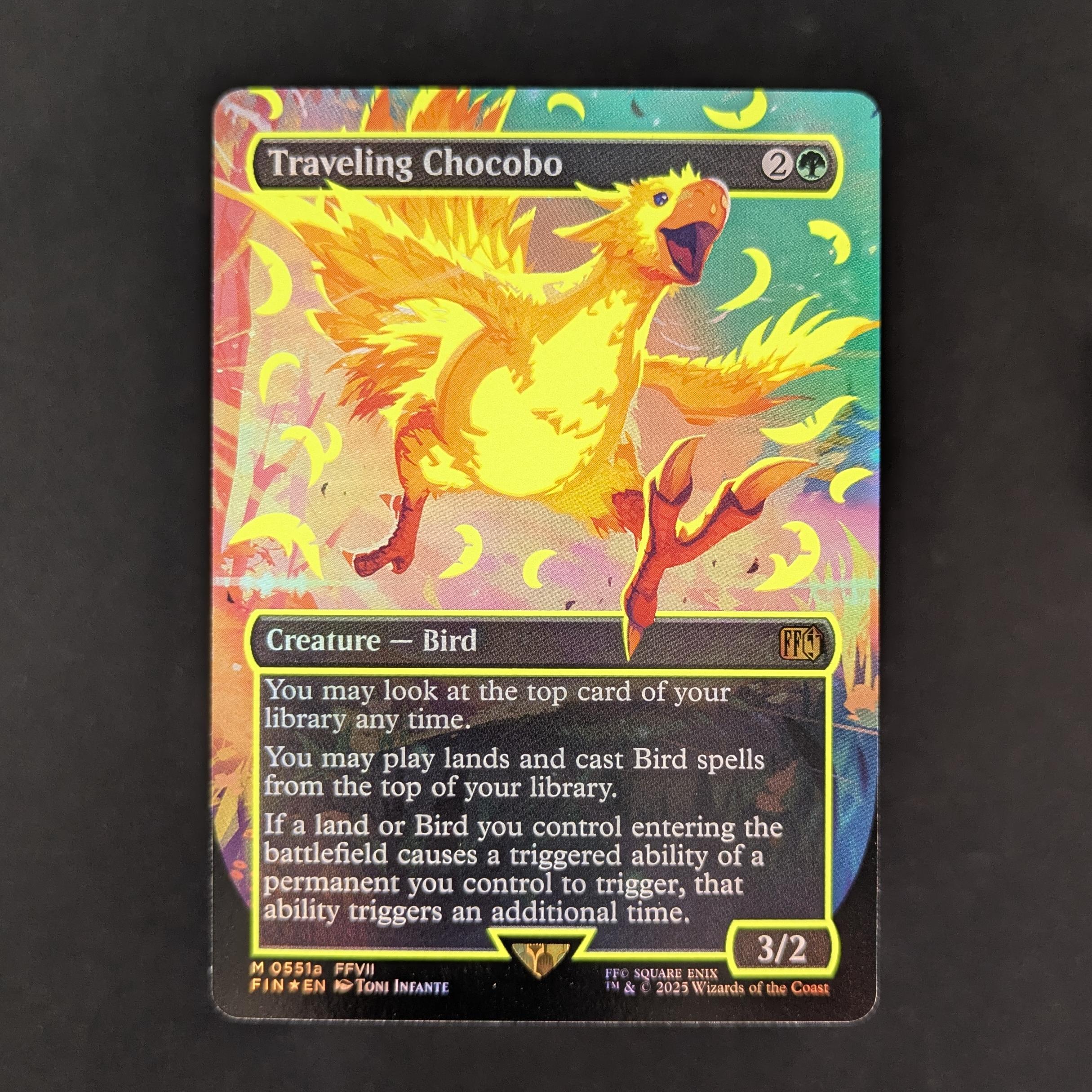 [FOIL] Traveling Chocobo (Borderless) (Neon Ink Yellow) - FINAL FANTASY: Extras - English - NM - Extended Art Slab