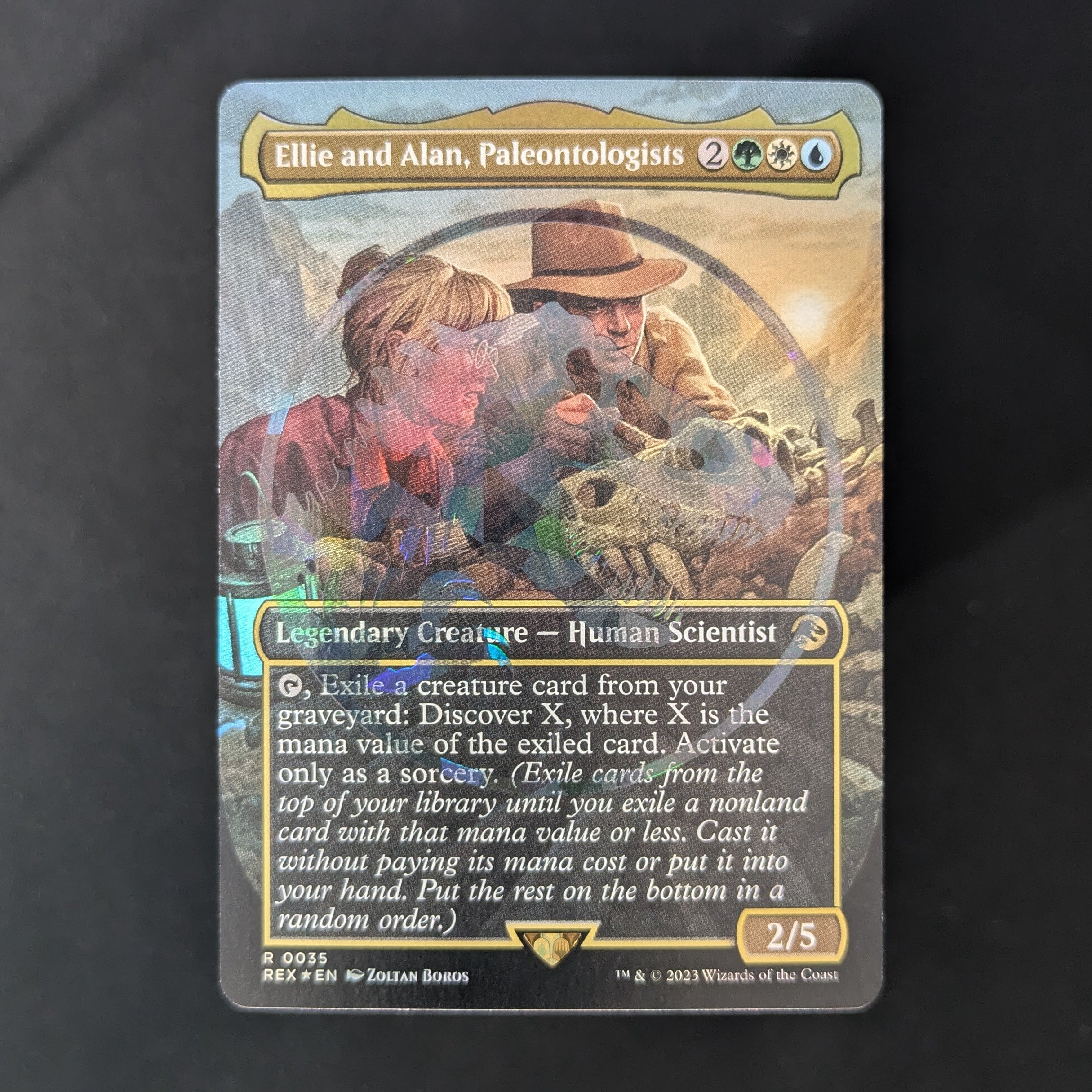 [FOIL] Ellie and Alan, Paleontologists (Borderless) (Emblem) - Universes Beyond: Jurassic World Collection - English - NM